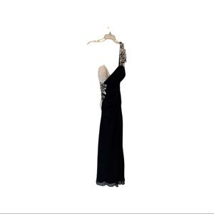 Faviana white and black backless gown embellished flowers